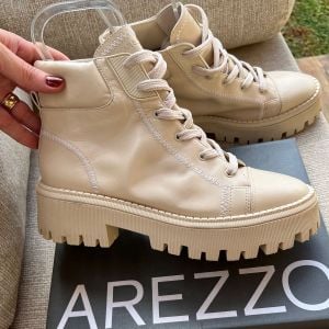 bota coturno arezzo off white tratorado desejo inverno 2026 141375084?action_source=71711&ref=home_home&rsp=1&rspix=1