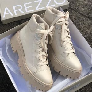 bota coturno arezzo off white tratorada couro legitimo desejo inverno 2026 137604542?action_source=64649&ref=home_home&rsp=1&rspix=1