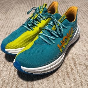 tenis hoka de corrida azul e amarelo 41 141258089?action_source=76398&ref=home_home&rsp=1&rspix=1