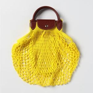 bolsa longchamp le pliage filet amarela 145411451?action_source=73496&ref=home_home&rsp=1&rspix=1