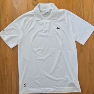 camisa polo lacoste x danil medvedev 137801284?action_source=68872&ref=home_home&rsp=1&rspix=1