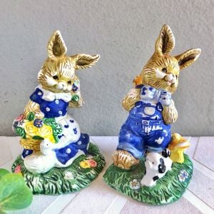 par de coelhinhos em porcelana biscuit policromada 12cm 128093095?action_source=69170&ref=home_home&rsp=1&rspix=1