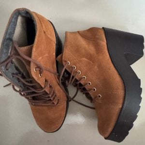 bota feminina marrom 34 143927772?action_source=75013&ref=home_home&rsp=1&rspix=1