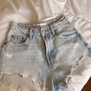 shorts jeans zara lavagem clara 32 147123093?action_source=76596&ref=home_home&rsp=1&rspix=1