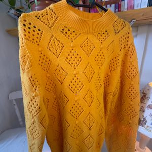 blusa tricot marfinno amarela p 142257052?action_source=31319&ref=home_home&rsp=1&rspix=1