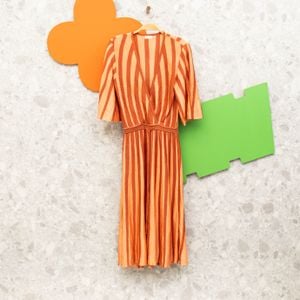 vestido midi tricot salmao gig couture 140425620?action_source=31319&ref=home_home&rsp=1&rspix=1
