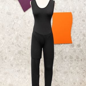 macacao preto com recorte nas costas 139089332?action_source=69367&ref=home_home&rsp=1&rspix=1