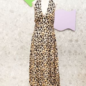 vestido frente unica animal print deep 140599653?action_source=70390&ref=home_home&rsp=1&rspix=1