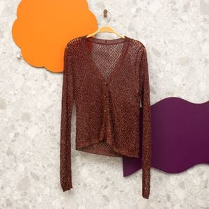 cardigan vermelho lurex 138619499?action_source=70786&ref=home_home&rsp=1&rspix=1