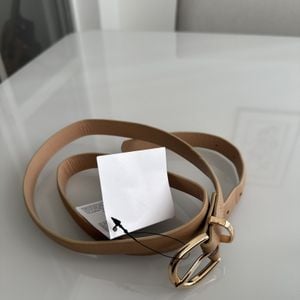 cinto zara feminino bege 143344758?action_source=75772&ref=home_home&rsp=1&rspix=1