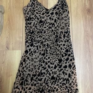 vestido de onca 126961666?action_source=32581&ref=home_home&rsp=1&rspix=1