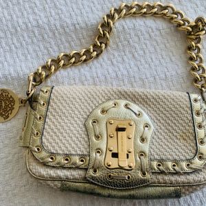 bolsa de ombro versace dourada 142022190?action_source=74814&ref=home_home&rsp=1&rspix=1