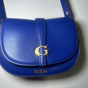 bolsa tiracolo guess azul 139657013?action_source=71545&ref=home_home&rsp=1&rspix=1