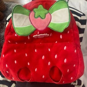 mochila moranguinho baby pelucia 127814867?action_source=66794&ref=home_home&rsp=1&rspix=1