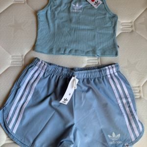 conjunto adidas azul m 147043649?action_source=75018&ref=home_home&rsp=1&rspix=1