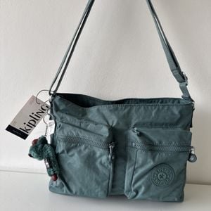 bolsa kipling verde transversal importada dos estados unidos com tag modelo kia1n3 nova 145479616?action_source=64648&ref=home_home&rsp=1&rspix=1