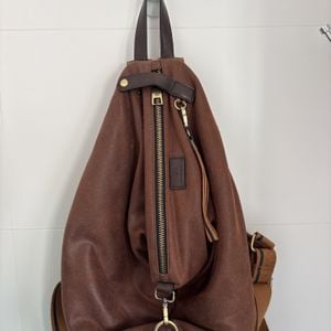 mochila wj acessorios camurca marrom 150087990?action_source=64648&ref=home_home&rsp=1&rspix=1