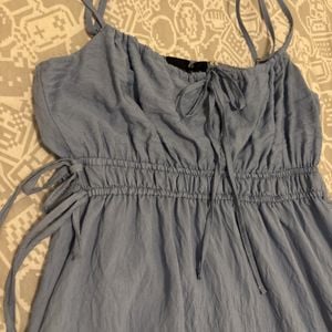 vestido midi azul claro com detalhes 151232233?action_source=74549&ref=home_home&rsp=1&rspix=1
