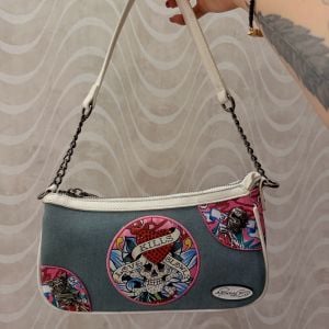 bolsa ed hardy love kills slowly 141707120?action_source=72701&ref=home_home&rsp=1&rspix=1