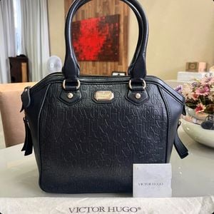 bolsa victor hugo original couro preta 142887530?action_source=72470&ref=home_home&rsp=1&rspix=1