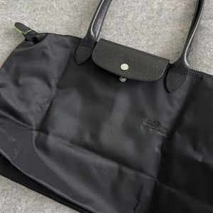 bolsa tote longchamp le pliage grande preta nova 136936454?action_source=68872&ref=home_home&rsp=1&rspix=1