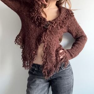 cardigan tricot marrom franjas m 144377411?action_source=31319&ref=home_home&rsp=1&rspix=1