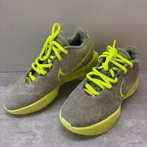 tenis nike cinza e verde limao 143719104?action_source=76398&ref=home_home&rsp=1&rspix=1