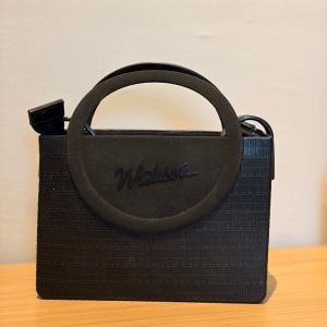 bolsa melissa preta com alca longa 151855367?action_source=76405&ref=home_home&rsp=1&rspix=1