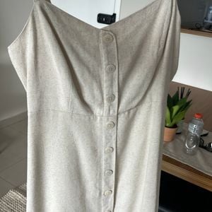 vestido off white linho curto com elastico nas costas tamanho p 138973214?action_source=31319&ref=home_home&rsp=1&rspix=1