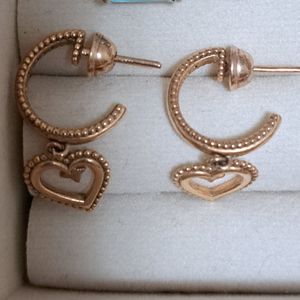 brinco argola life love coracao em liga rose com banho de ouro rose 18k 29mm 147170585?action_source=67326&ref=home_home&rsp=1&rspix=1