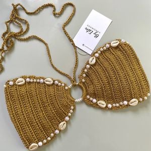 top concha carnaval dourado croche 134346367?action_source=67456&ref=home_home&rsp=1&rspix=1