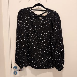 blusa poa shoulder 132991393?action_source=70657&ref=home_home&rsp=1&rspix=1