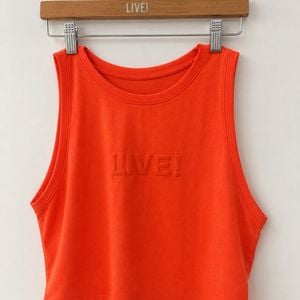 regata cropped live comfort laranja 153212864?action_source=77518&ref=home_home&rsp=1&rspix=1