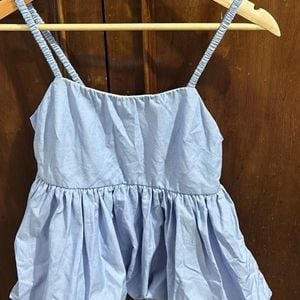 regata feminina azul bebe listrada 148334665?action_source=72767&ref=home_home&rsp=1&rspix=1