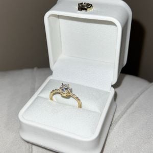 anel folheado dourado com zirconia 137805556?action_source=68872&ref=home_home&rsp=1&rspix=1