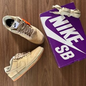 tenis nike sb dunk low pro bege masculino 143542566?action_source=31946&ref=home_home&rsp=1&rspix=1