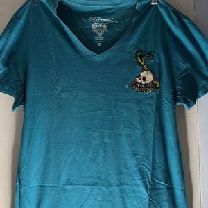 camiseta ed hardy 130584240?action_source=72140&ref=home_home&rsp=1&rspix=1