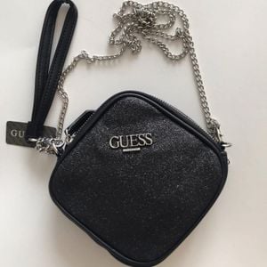 bolsa guess brilho glitter preta 119565963?action_source=70655&ref=home_home&rsp=1&rspix=1