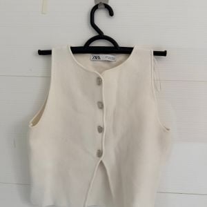 colete zara trico feminino p 150735316?action_source=75868&ref=home_home&rsp=1&rspix=1