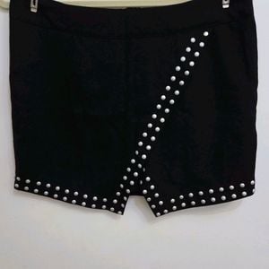 saia riachuelo preta com tachas 40 150548927?action_source=74549&ref=home_home&rsp=1&rspix=1