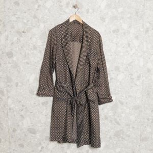 vestido marrom geometrico casa kosmos 145293839?action_source=67322&ref=home_home&rsp=1&rspix=1