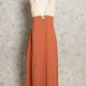 vestido terracota conxa 133760827?action_source=73427&ref=home_home&rsp=1&rspix=1