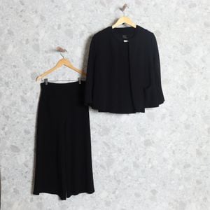 conjunto casaquinho blusa e calca preto fit 132733131?action_source=69532&ref=home_home&rsp=1&rspix=1