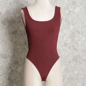 body bordo canelado nati vozza 147351194?action_source=75015&ref=home_home&rsp=1&rspix=1
