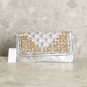 bolsa prata 134750885?action_source=69004&ref=home_home&rsp=1&rspix=1