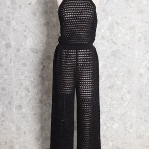 macacao croche preto anselmi 132583641?action_source=73427&ref=home_home&rsp=1&rspix=1