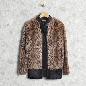 jaqueta marrom animal print 126467329?action_source=71744&ref=home_home&rsp=1&rspix=1