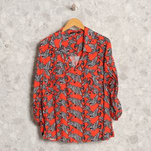 camisa laranja animal print rubinella 128721706?action_source=69532&ref=home_home&rsp=1&rspix=1
