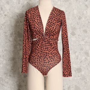 body caramelo animal print chamelle 126885798?action_source=62833&ref=home_home&rsp=1&rspix=1
