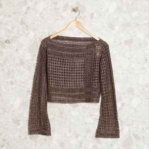 casaco trico marrom 137038225?action_source=69004&ref=home_home&rsp=1&rspix=1